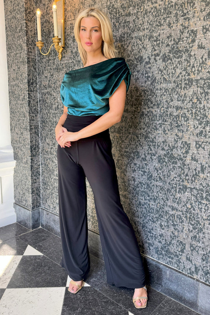 Carbon jumpsuit in forest green velvet & black