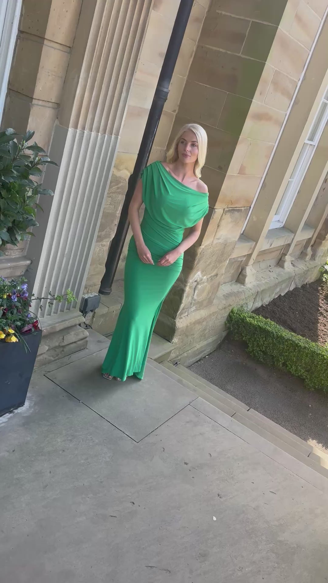 Platinum gown in emerald green